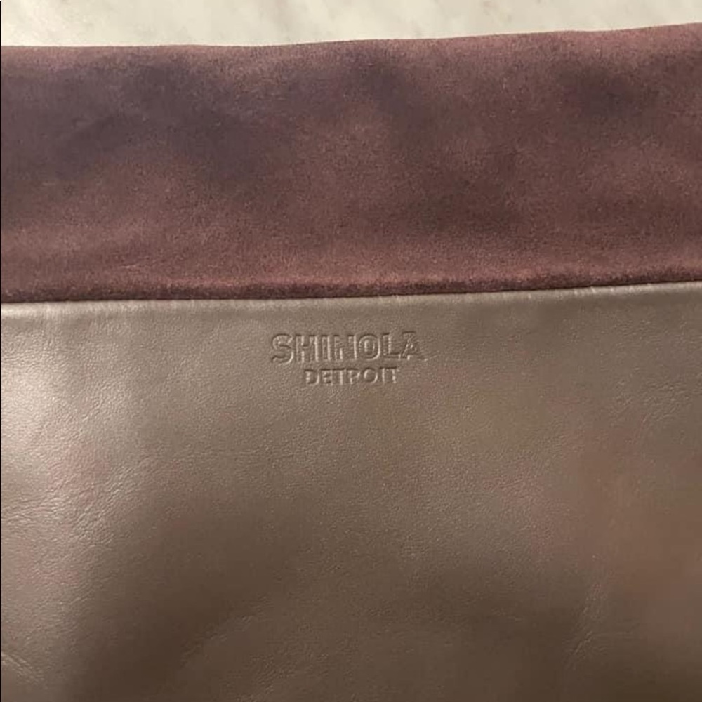 Shinola clutch. Fold over top. Half leather half suede. Brand new!! Super cute!